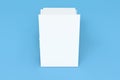 Stack of blank white closed brochure mock-up on blue background Royalty Free Stock Photo