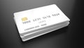 Stack of Blank white credit cards template on black background Royalty Free Stock Photo
