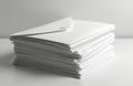Stack of blank white envelopes rests on clean surface. Paper mailers ready for business correspondence personal creative Royalty Free Stock Photo