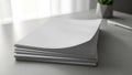 Stack of Blank White Paper on a Gray Surface Royalty Free Stock Photo