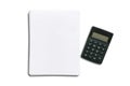 a stack of blank white paper next to a small, black electronic calculator isolated on a white background with copy space. office Royalty Free Stock Photo