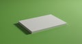 A stack of blank white paper rests on a smooth green surface. The paper is neatly Royalty Free Stock Photo