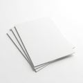 A stack of blank white paper sheets on a white background Royalty Free Stock Photo