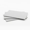 A stack of blank white paper sheets on a white background Royalty Free Stock Photo