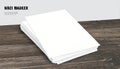 Stack of blank white paper sheets on a dark wooden desk with text overlay Royalty Free Stock Photo