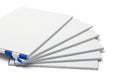 Stack of blank white paper sheets fanned out on a clean white background isolated on white background Royalty Free Stock Photo