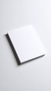 Stack of blank white paper sheets on a light surface with shadow Royalty Free Stock Photo