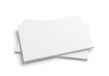 A stack of blank white paper sheets placed on a plain white background for various design and mockup purposes Royalty Free Stock Photo