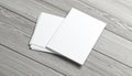 Stack of blank white paper sheets on a weathered grey wooden surface Royalty Free Stock Photo