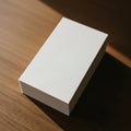 Stack of Blank White Paper on Wooden Surface with Dramatic Lighting Royalty Free Stock Photo