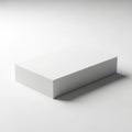 A stack of blank, white printer paper rests on a plain surface. The sheets are neatly Royalty Free Stock Photo