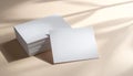 Stack of Blank White Square Cards with Natural Light Shadows Royalty Free Stock Photo