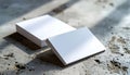 Stack of Blank White Square Cards on Textured Concrete Surface Royalty Free Stock Photo