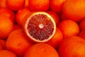 Stack of Blood oranges on a market stall