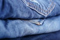 Stack blue jeans closeup Royalty Free Stock Photo