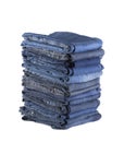 Stack of blue jeans isolated on white background Royalty Free Stock Photo