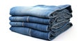 A stack of blue jeans on a plain white background. Perfect for fashion or retail concepts Royalty Free Stock Photo
