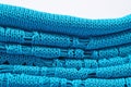 Stack of blue knitted closeup