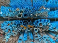The stack of pipes in construction shop