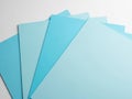 Stack of blue paper sheets isolated on white background Royalty Free Stock Photo