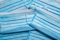 A stack of blue paper surgical masks. COVID, virus theme Royalty Free Stock Photo