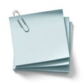 Stack of blue sticky notes with paperclip isolated on white background Royalty Free Stock Photo
