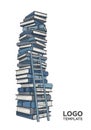 Stack of blue and white books forms a tall, unstable tower. Royalty Free Stock Photo
