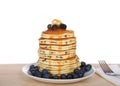 Stack of blueberry pancakes stacked high