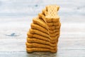 Stack of Bone shaped dog biscuits of brown color. Dog food used for training Royalty Free Stock Photo