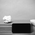 Stack of book with smart phone black and white color tone style Royalty Free Stock Photo