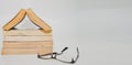 Stack of books arranged pile on white background with glasses on top with open book copy space Royalty Free Stock Photo