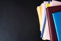 Stack of books on black background