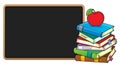 Stack of books and blackboard Royalty Free Stock Photo
