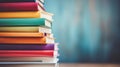 A stack of books with a blue background, AI Royalty Free Stock Photo