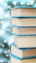Stack of Books with Blue Covers on a Sparkling Background, Education and Knowledge Concept Royalty Free Stock Photo