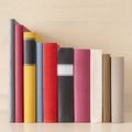 Stack of books in the bookself Royalty Free Stock Photo
