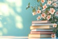 Stack of books with a bunch of flowers. Concept of reading, education, wisdom and knowledge Royalty Free Stock Photo