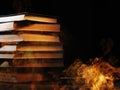 Stack of books in a burning fire