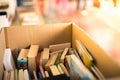 Stack of books at a charity book flea market, text space Royalty Free Stock Photo
