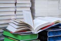 stack of books, close up. Open book on the table in library. Back to school concept. Royalty Free Stock Photo