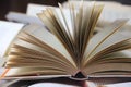 stack of books, close up. Open book on the table in library. Back to school concept. Royalty Free Stock Photo