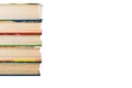 A stack of books in color covers on white background. Royalty Free Stock Photo