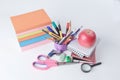 Stack of books and colorful school supplies on white background.photo with copy space Royalty Free Stock Photo