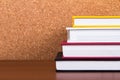 Stack of Books with Cork Board