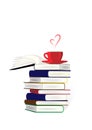 Stack of books and a cup of coffe or tea on the top isolated on the white background, vertical vector Royalty Free Stock Photo