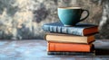 a stack of books with a cup of coffee on top Royalty Free Stock Photo