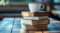a stack of books with a cup of coffee on top Royalty Free Stock Photo