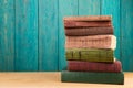 stack of books on the desk over wooden background Royalty Free Stock Photo