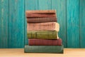 stack of books on the desk over wooden background Royalty Free Stock Photo