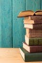 stack of books on the desk over wooden background Royalty Free Stock Photo